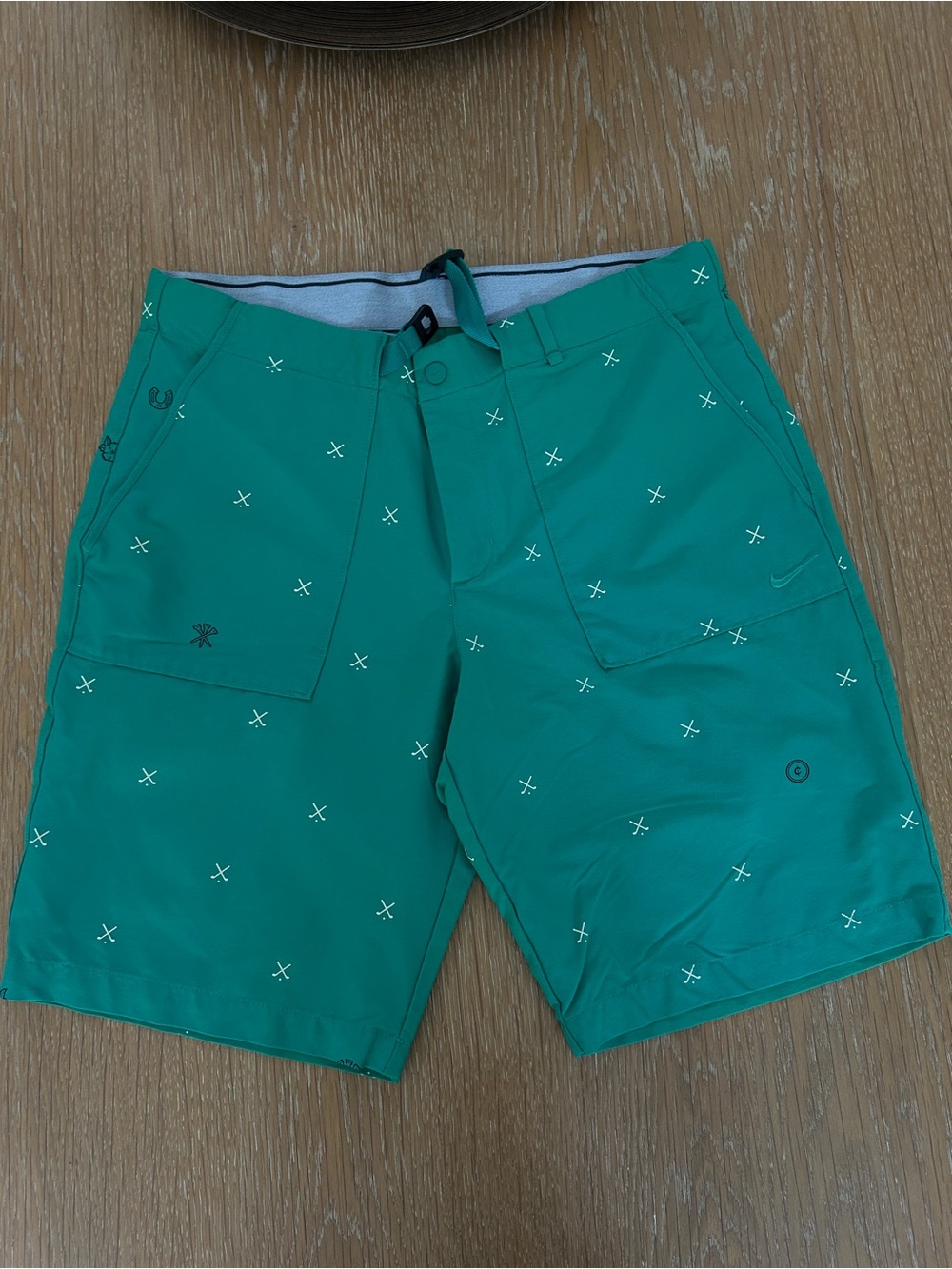 Nike Green Athletic Golf Shorts with screen printed golf detail - size L